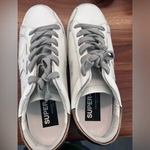 Golden Goose Superstar distressed metallic leather sneakers